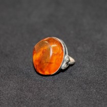 Silver finger ring with amber